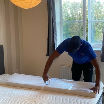 Person moving items into secure storage in London