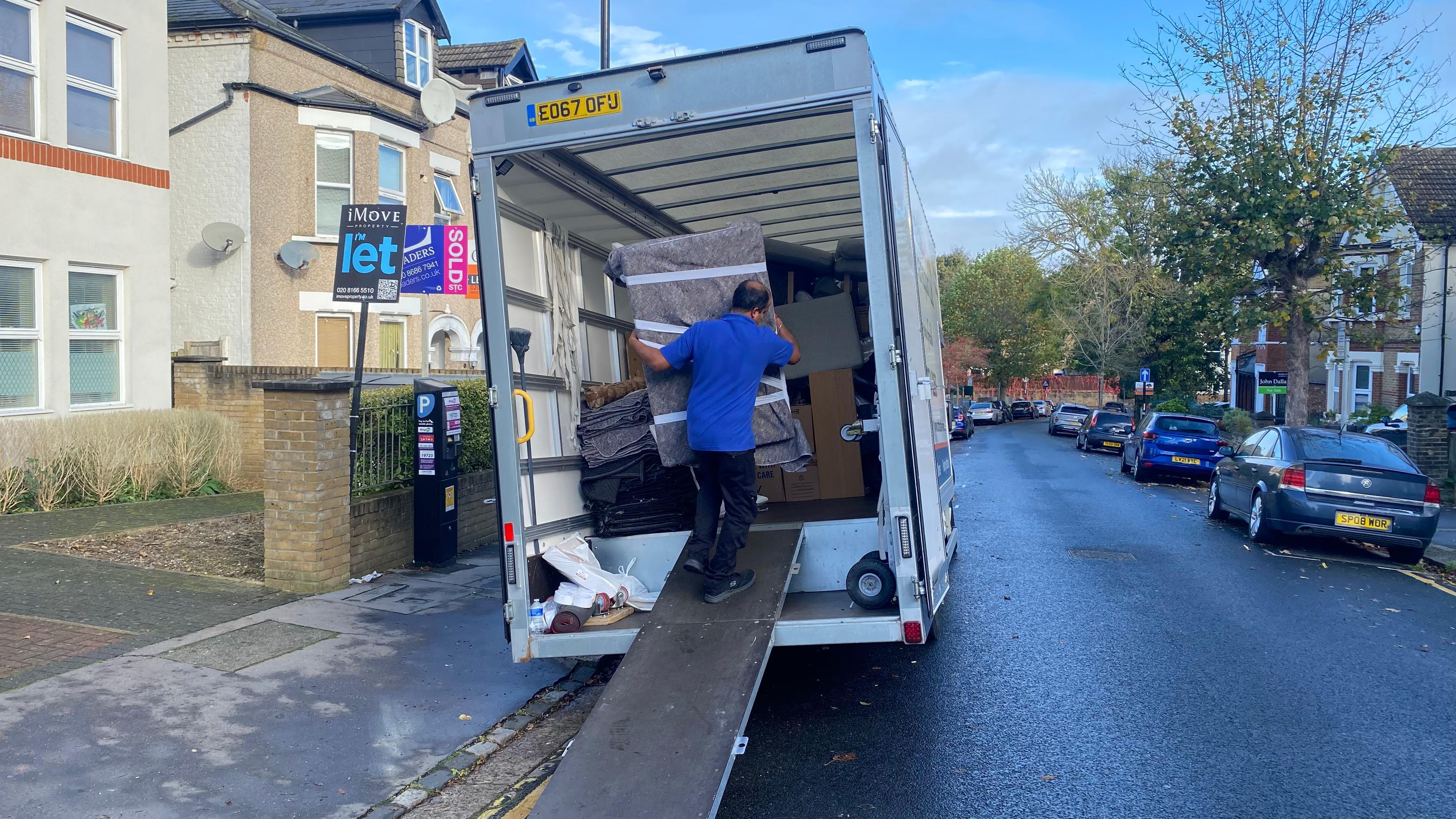 Professional movers assisting with a house removal