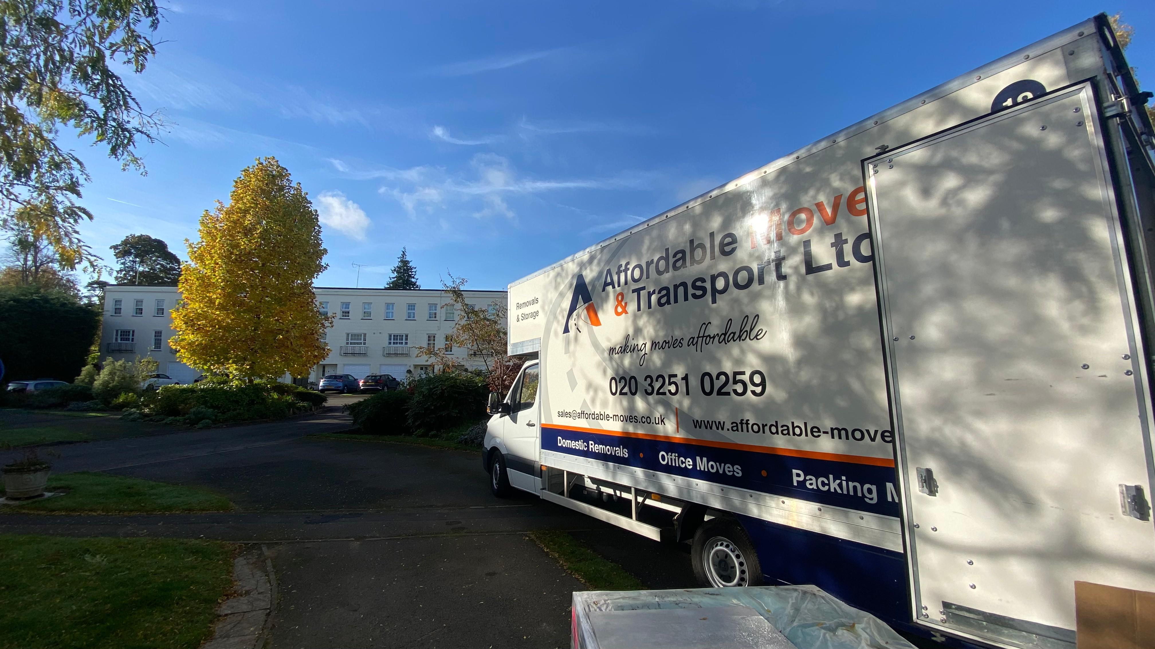 Students moving out of a shared house with help from removals team
